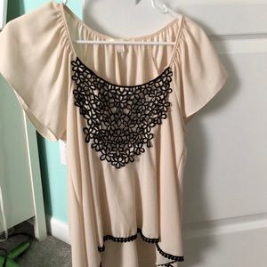 Cream and black blouse